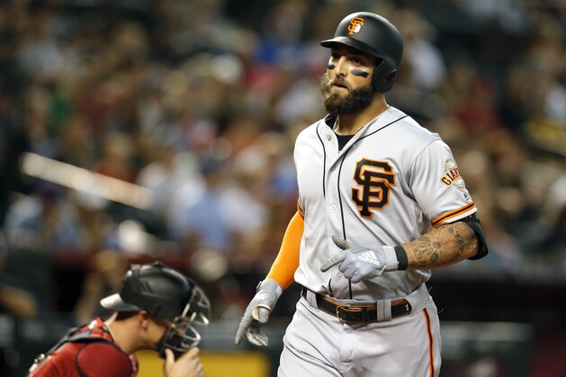 San Francisco Giants' Kevin Pillar crosses home plate after hitting a solo home run against the Arizona Diamondbacks in the seventh inning during a baseball game, Sunday, June 23, 2019, in Phoenix. (AP Photo/Rick Scuteri)