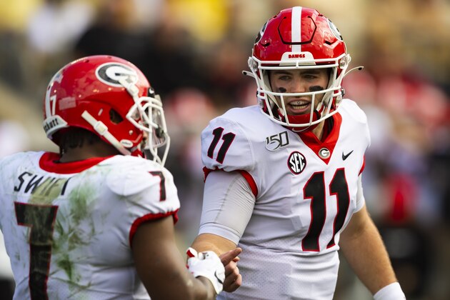 Georgia quarterback Jake Fromm (11) talks to running back D'Andre Swift during an NCAA college football game against Georgia Tech, Saturday, Nov. 30, 2019 in Atlanta. (AP Photo/John Amis) Georgia quarterback Jake Fromm (11) talks to running back D'Andre Swift during an NCAA college football game against Georgia Tech, Saturday, Nov. 30, 2019 in Atlanta. (AP Photo/John Amis)