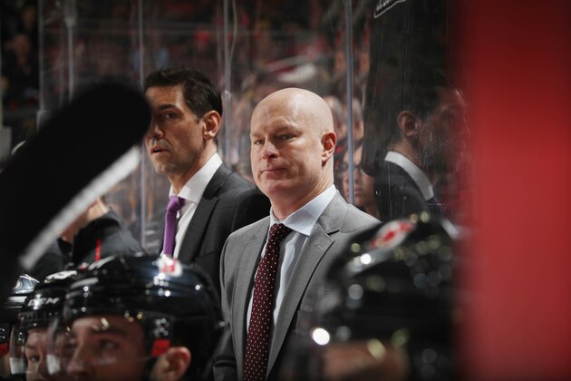 NEWARK, NEW JERSEY - FEBRUARY 19: John Hynes of the New Jersey Devils works the bench against the New Jersey Devils at the Prudential Center on February 19, 2019 in Newark, New Jersey. The Penguins defeated the Devils 4-3. (Photo by Bruce Bennett/Getty Images)