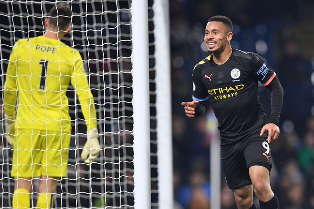 Manchester City's Brazilian striker Gabriel Jesus celebrates after scoring their second goal during the English Premier League football match between Burnley and Manchester City at Turf Moor in Burnley, north west England on December 3, 2019. (Photo by Paul ELLIS / AFP) / RESTRICTED TO EDITORIAL USE. No use with unauthorized audio, video, data, fixture lists, club/league logos or 'live' services. Online in-match use limited to 120 images. An additional 40 images may be used in extra time. No video emulation. Social media in-match use limited to 120 images. An additional 40 images may be used in extra time. No use in betting publications, games or single club/league/player publications. /  (Photo by PAUL ELLIS/AFP via Getty Images)