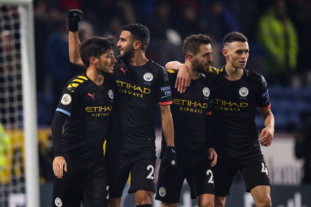 BURNLEY, ENGLAND - DECEMBER 03: Riyad Mahrez of Manchester City celebrates after scoring a goal to make it 0-4 during the Premier League match between Burnley FC and Manchester City at Turf Moor on December 3, 2019 in Burnley, United Kingdom. (Photo by Robbie Jay Barratt - AMA/Getty Images)