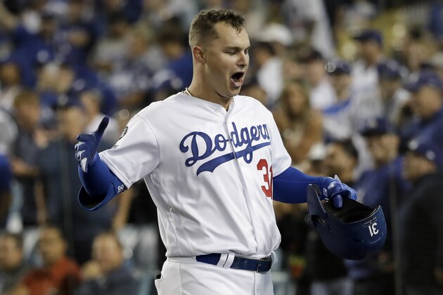 Los Angeles Dodgers' Joc Pederson celebrates his home run against the Washington Nationals during the eighth inning of Game 1 in baseball's National League Divisional Series on Thursday, Oct. 3, 2019, in Los Angeles. (AP Photo/Marcio Jose Sanchez)
