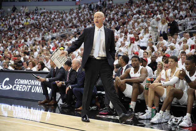 LOUISVILLE, KENTUCKY - DECEMBER 03:   Chris Mack the head coach of the Louisville Cardinals gives instructions to his team against the Michigan Wolverines at KFC YUM! Center on December 03, 2019 in Louisville, Kentucky. (Photo by Andy Lyons/Getty Images)