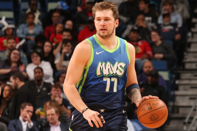 NEW ORLEANS, LA - DECEMBER 3: Luka Doncic #77 of the Dallas Mavericks handles the ball against the New Orleans Pelicans on December 3, 2019 at the Smoothie King Center in New Orleans, Louisiana. NOTE TO USER: User expressly acknowledges and agrees that, by downloading and or using this Photograph, user is consenting to the terms and conditions of the Getty Images License Agreement. Mandatory Copyright Notice: Copyright 2019 NBAE (Photo by Layne Murdoch Jr./NBAE via Getty Images)