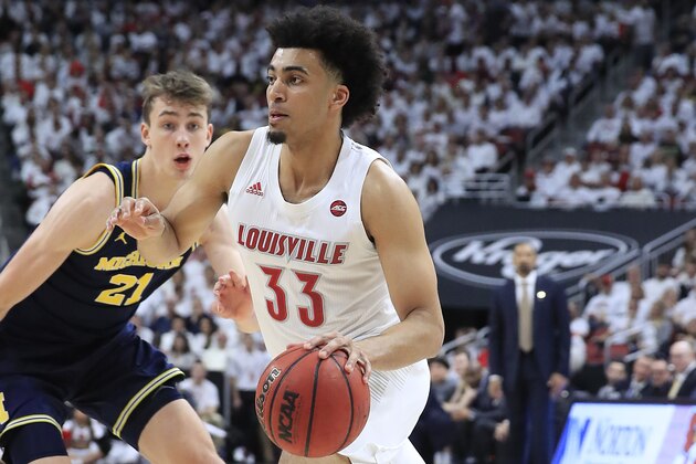 LOUISVILLE, KENTUCKY - DECEMBER 03:   Jordan Nwora #33 of the Louisville Cardinals dribbles the ball during the 58-43 win against the Michigan Wolverines at KFC YUM! Center on December 03, 2019 in Louisville, Kentucky. (Photo by Andy Lyons/Getty Images)