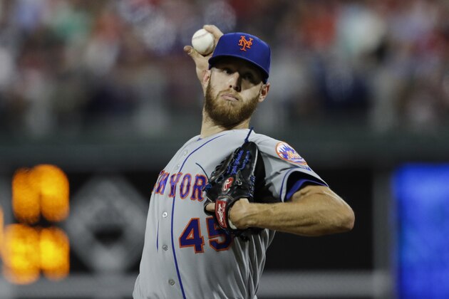 New York Mets starting pitcher Zack Wheeler in action during a baseball game against the Philadelphia Phillies, Friday, Aug. 30, 2019, in Philadelphia. (AP Photo/Matt Rourke)