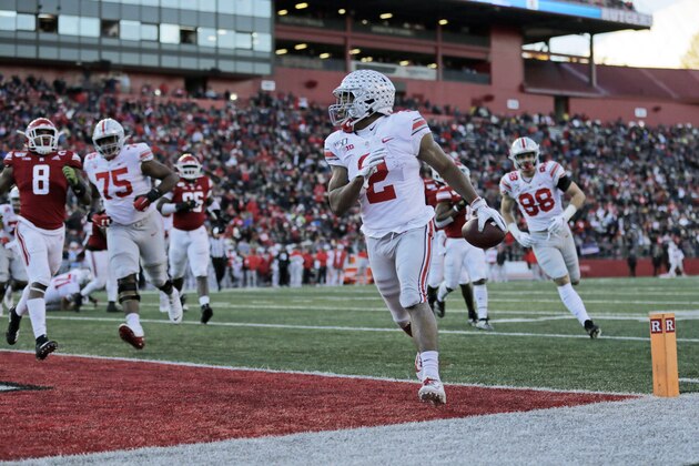 Ohio State running back J.K. Dobbins scores a touchdown against Rutgers during the first half of an NCAA college football game Saturday, Nov. 16, 2019, in Piscataway, N.J. (AP Photo/Adam Hunger)