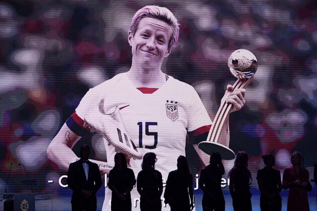 A video of Reign FC's US midfielder Megan Rapinoe is displayed after she won the Ballon d'Or France Football 2019 women's trophy at the Chatelet Theatre in Paris on December 2, 2019. (Photo by FRANCK FIFE / AFP) (Photo by FRANCK FIFE/AFP via Getty Images)