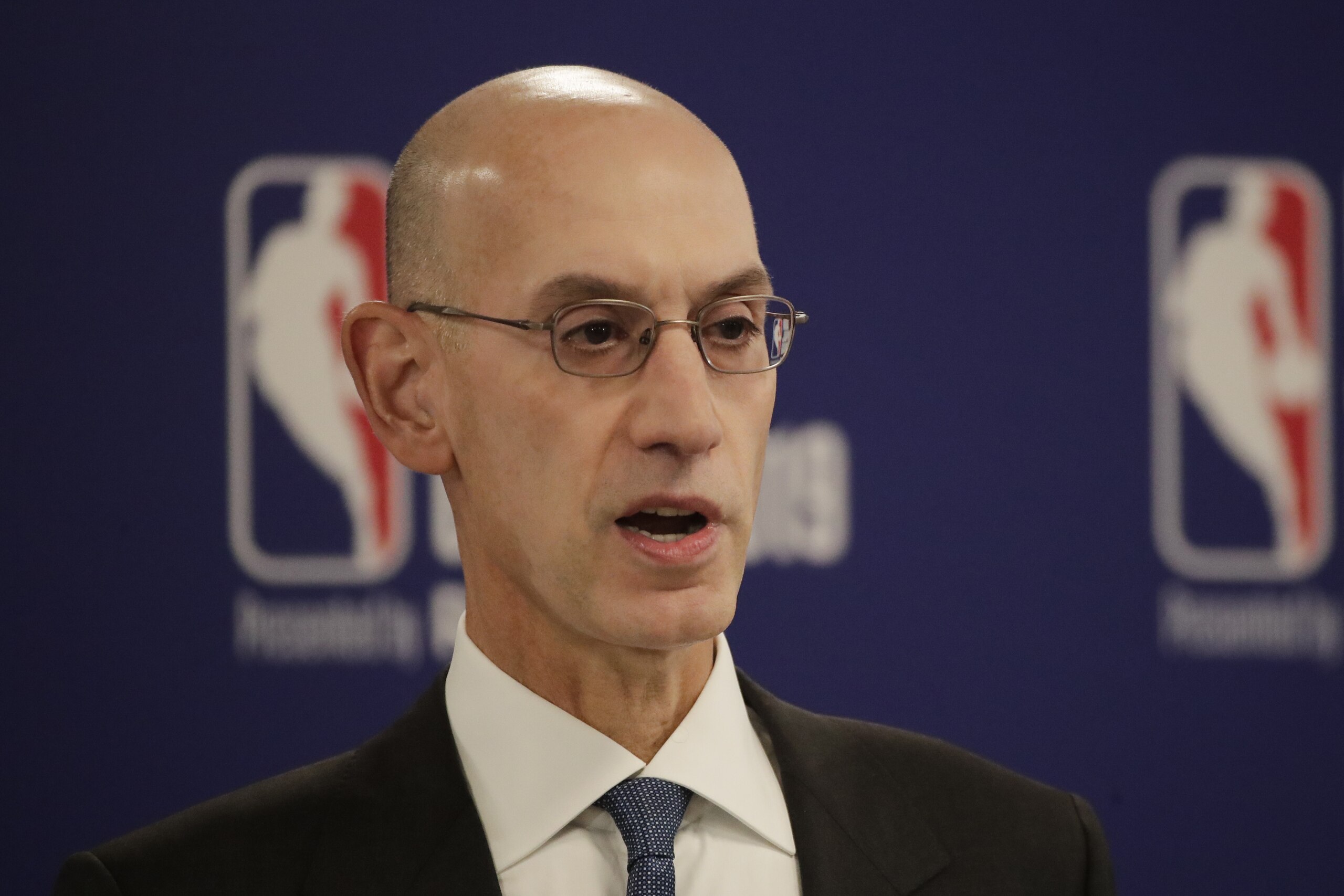 NBA Commissioner Adam Silver speaks at a news conference before an NBA preseason basketball game between the Houston Rockets and the Toronto Raptors Tuesday, Oct. 8, 2019, in Saitama, near Tokyo. (AP Photo/Jae C. Hong)