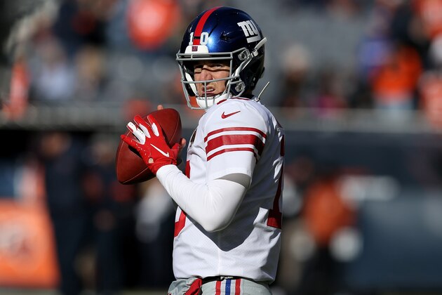 CHICAGO, ILLINOIS - NOVEMBER 24: Eli Manning #10 of the New York Giants warms up before the game against the Chicago Bears at Soldier Field on November 24, 2019 in Chicago, Illinois. (Photo by Dylan Buell/Getty Images)