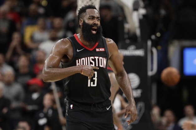 Houston Rockets guard James Harden (13) reacts to a play during overtime of an NBA basketball game against the San Antonio Spurs, in San Antonio, Tuesday, Dec. 3, 2019. San Antonio won 135-133 in double overtime. (AP Photo/Eric Gay)