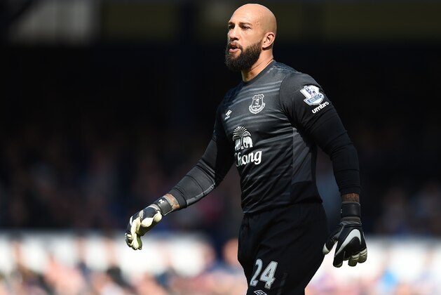 Everton's US goalkeeper Tim Howard reacts during the English Premier League football match between Everton and Norwich City at Goodison Park in Liverpool, north west England on May 15, 2016. / AFP / PAUL ELLIS / RESTRICTED TO EDITORIAL USE. No use with unauthorized audio, video, data, fixture lists, club/league logos or 'live' services. Online in-match use limited to 75 images, no video emulation. No use in betting, games or single club/league/player publications.  /         (Photo credit should read PAUL ELLIS/AFP via Getty Images)
