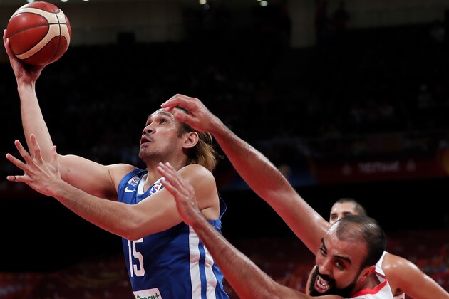 BEIJING, CHINA - SEPTEMBER 06: June Mar Fajardo #15 of the Philippines National Team in action against the Tunisia National Team during the classification round of 2019 FIBA World Cup on September 6, 2019 in Beijing, China. (Photo by Xinyu Cui/Getty Images)