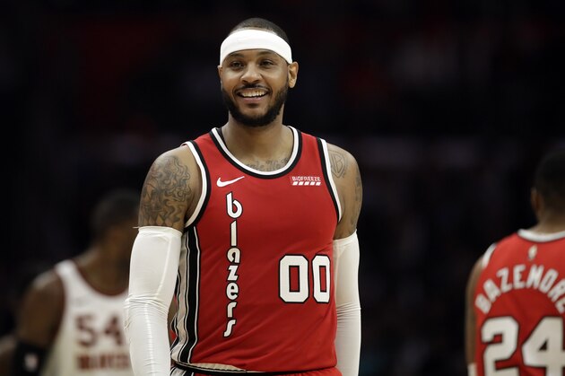 Portland Trail Blazers' Carmelo Anthony (00) smiles during the second half of an NBA basketball game against the Los Angeles Clippers Tuesday, Dec. 3, 2019, in Los Angeles. (AP Photo/Marcio Jose Sanchez) Portland Trail Blazers' Carmelo Anthony (00) smiles during the second half of an NBA basketball game against the Los Angeles Clippers Tuesday, Dec. 3, 2019, in Los Angeles. (AP Photo/Marcio Jose Sanchez)