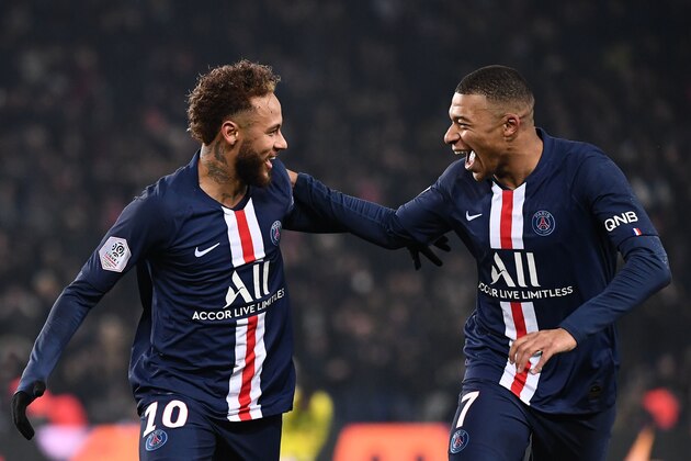 Paris Saint-Germain's Brazilian forward Neymar (L) and Paris Saint-Germain's French forward Kylian Mbappe celebrate after scoring their team's first goal during the French L1 football match between Paris Saint-Germain (PSG) and FC Nantes (FCN) at the Parc des Princes in Paris, on December 4, 2019. (Photo by FRANCK FIFE / AFP) (Photo by FRANCK FIFE/AFP via Getty Images)