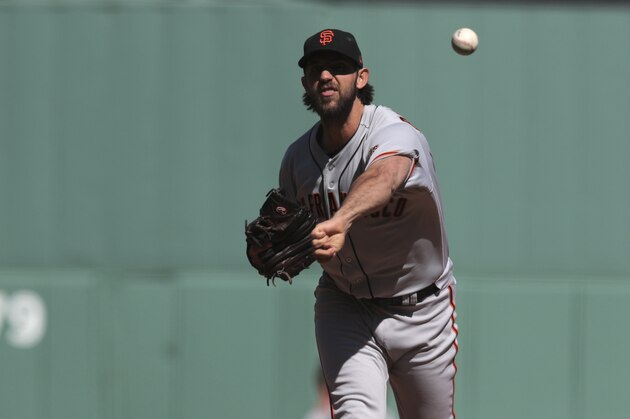 San Francisco Giants starting pitcher Madison Bumgarner delivers during the first inning of a baseball game against the Boston Red Sox at Fenway Park in Boston, Thursday, Sept. 19, 2019. (AP Photo/Charles Krupa)
