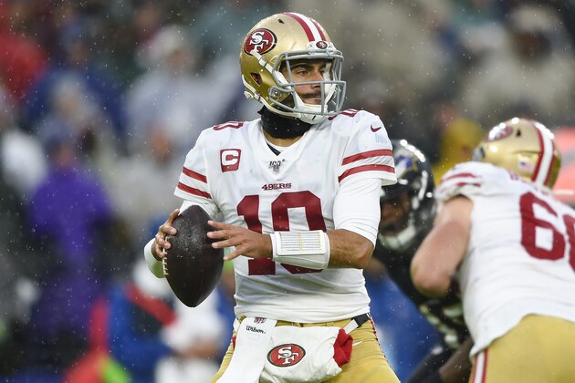 San Francisco 49ers quarterback Jimmy Garoppolo looks to pass the ball during the first half of an NFL football game against the Baltimore Ravens, Sunday, Dec. 1, 2019, in Baltimore, Md. (AP Photo/Gail Burton)