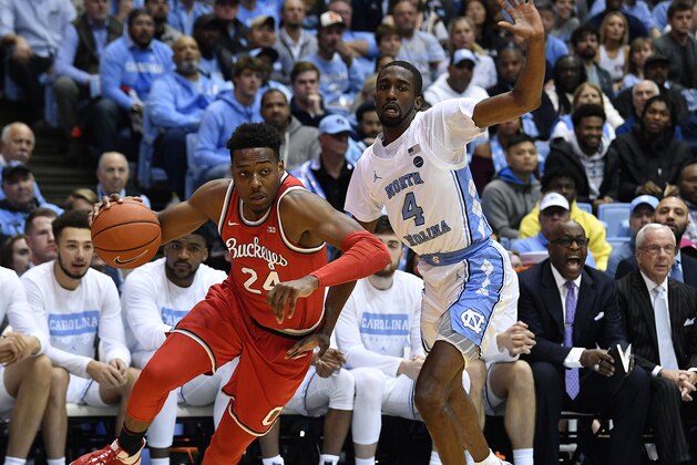CHAPEL HILL, NORTH CAROLINA - DECEMBER 04: Andre Wesson #24 of the Ohio State Buckeyes drives against Brandon Robinson #4 of the North Carolina Tar Heels during the first half of their game at the Dean Smith Center on December 04, 2019 in Chapel Hill, North Carolina. (Photo by Grant Halverson/Getty Images) CHAPEL HILL, NORTH CAROLINA - DECEMBER 04: Andre Wesson #24 of the Ohio State Buckeyes drives against Brandon Robinson #4 of the North Carolina Tar Heels during the first half of their game at the Dean Smith Center on December 04, 2019 in Chapel Hill, North Carolina. (Photo by Grant Halverson/Getty Images)