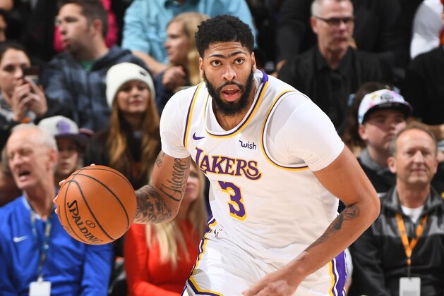 SALT LAKE CITY, UT - DECEMBER 4: Anthony Davis #3 of the Los Angeles Lakers handles the ball against the Utah Jazz on December 4, 2019 at vivint.SmartHome Arena in Salt Lake City, Utah. NOTE TO USER: User expressly acknowledges and agrees that, by downloading and or using this Photograph, User is consenting to the terms and conditions of the Getty Images License Agreement. Mandatory Copyright Notice: Copyright 2019 NBAE (Photo by Garrett Ellwood/NBAE via Getty Images)