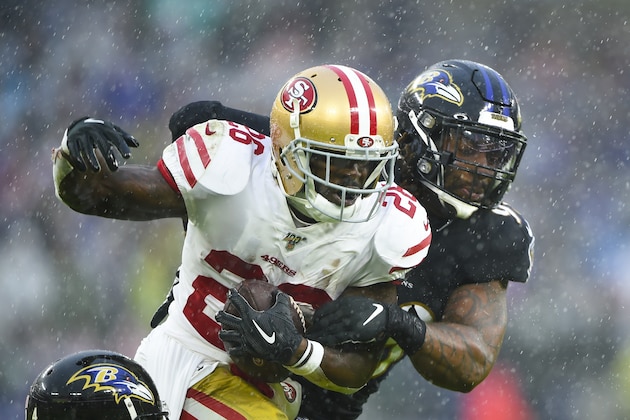 San Francisco 49ers running back Tevin Coleman (26) is taken down by Baltimore Ravens outside linebacker Matt Judon (99) in the first half of an NFL football game, Sunday, Dec. 1, 2019, in Baltimore, Md. (AP Photo/Gail Burton) San Francisco 49ers running back Tevin Coleman (26) is taken down by Baltimore Ravens outside linebacker Matt Judon (99) in the first half of an NFL football game, Sunday, Dec. 1, 2019, in Baltimore, Md. (AP Photo/Gail Burton)