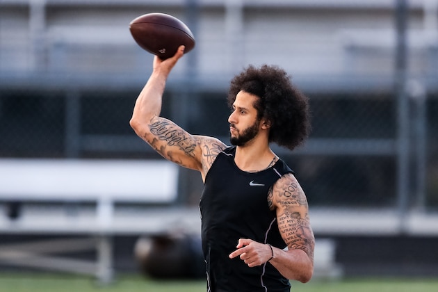 RIVERDALE, GA - NOVEMBER 16: Colin Kaepernick looks to pass during his NFL workout held at Charles R Drew high school on November 16, 2019 in Riverdale, Georgia. (Photo by Carmen Mandato/Getty Images)