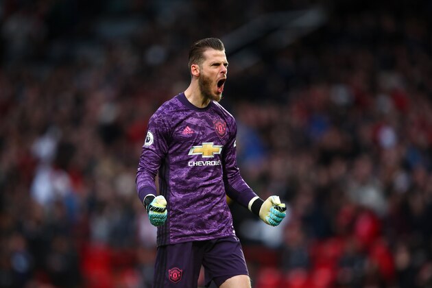 MANCHESTER, ENGLAND - OCTOBER 20: David de Gea of Manchester United celebrates after Marcus Rashford of Manchester United scored a goal to make it 1-0 during the Premier League match between Manchester United and Liverpool FC at Old Trafford on October 20, 2019 in Manchester, United Kingdom. (Photo by Robbie Jay Barratt - AMA/Getty Images)