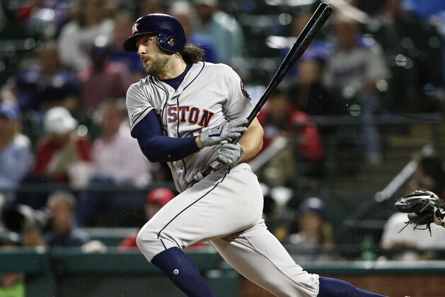 Houston Astros' Jake Marisnick bats against the Texas Rangers during the ninth inning of a baseball game Saturday, April 20, 2019, in Arlington, Texas. (AP Photo/Mike Stone)