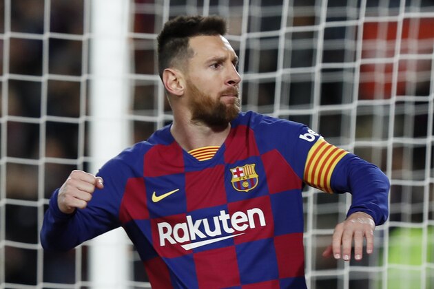 Barcelona's Lionel Messi celebrates scoring his side's first goal with a penalty during a Spanish La Liga soccer match between Barcelona and Celta at Camp Nou stadium in Barcelona, Saturday, Nov. 9, 2019. (AP Photo/Joan Monfort)