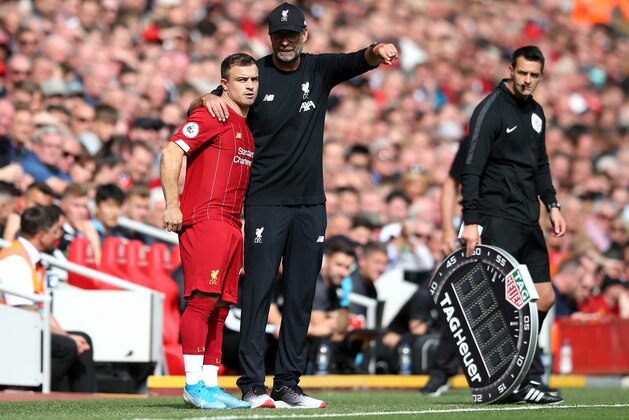 LIVERPOOL, ENGLAND - SEPTEMBER 14: Jurgen Klopp, Manager of Liverpool gives Xherdan Shaqiri of Liverpool instructions during the Premier League match between Liverpool FC and Newcastle United at Anfield on September 14, 2019 in Liverpool, United Kingdom. (Photo by Jan Kruger/Getty Images)
