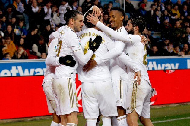VITORIA GASTEIZ, SPAIN - NOVEMBER 30: (L-R) Gareth Bale of Real Madrid, Sergio Ramos of Real Madrid, Eder Militao of Real Madrid, Isco of Real Madrid celebrate 0-1 during the La Liga Santander  match between Deportivo Alaves v Real Madrid at the Estadio de Mendizorroza on November 30, 2019 in Vitoria Gasteiz Spain (Photo by David S. Bustamante/Soccrates/Getty Images)
