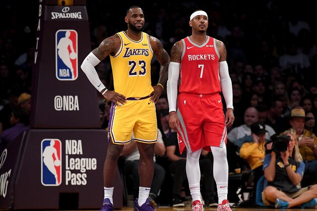 LOS ANGELES, CA - OCTOBER 20:  LeBron James #23 of the Los Angeles Lakers and Carmelo Anthony #7 of the Houston Rockets wait for and inbound at Staples Center on October 20, 2018 in Los Angeles, California.  (Photo by Harry How/Getty Images)