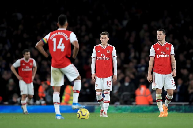 LONDON, ENGLAND - DECEMBER 05: Mesut Ozil of Arsenal and Granit Xhaka of Arsenal are looking dejected after Neal Maupay of Brighton scored during the Premier League match between Arsenal FC and Brighton & Hove Albion at Emirates Stadium on December 05, 2019 in London, United Kingdom. (Photo by Marc Atkins/Getty Images)