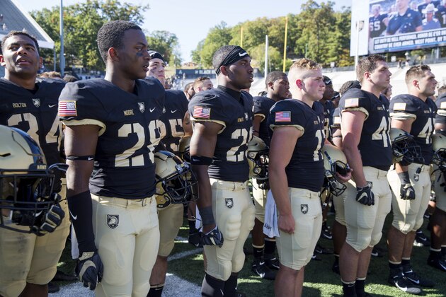 Army football players listen to the West Point Band play the alma mater after winning an NCAA college football game 52-21 against Morgan State, Saturday, Sept. 21, 2019 in West Point, N.Y. (AP Photo/Julius Constantine Motal)