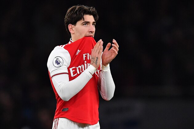 Arsenal's Spanish defender Hector Bellerin applauds the fans following the English Premier League football match between Arsenal and Brighton and Hove Albion at the Emirates Stadium in London on December 5, 2019. - Brighton won the match 2-1. (Photo by Ben STANSALL / AFP) / RESTRICTED TO EDITORIAL USE. No use with unauthorized audio, video, data, fixture lists, club/league logos or 'live' services. Online in-match use limited to 120 images. An additional 40 images may be used in extra time. No video emulation. Social media in-match use limited to 120 images. An additional 40 images may be used in extra time. No use in betting publications, games or single club/league/player publications. /  (Photo by BEN STANSALL/AFP via Getty Images)