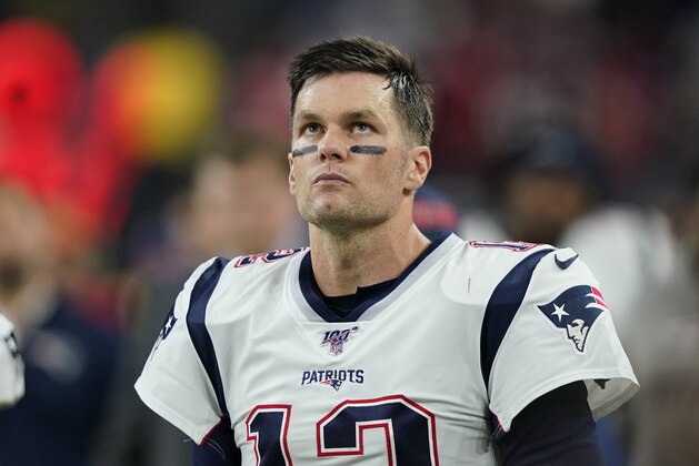 New England Patriots quarterback Tom Brady (12) stands on the sidelines during the first half of an NFL football game against the Houston Texans Sunday, Dec. 1, 2019, in Houston. (AP Photo/David J. Phillip)
