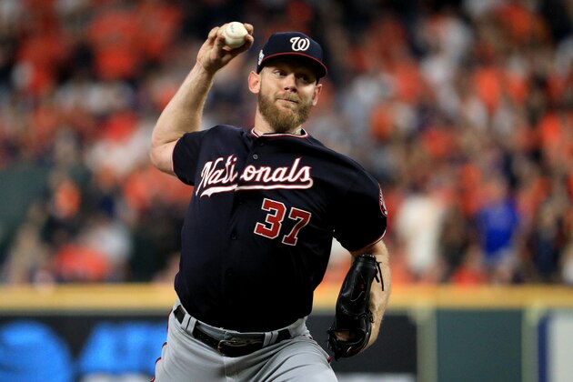 HOUSTON, TEXAS - OCTOBER 29:  Stephen Strasburg #37 of the Washington Nationals delivers the pitch against the Houston Astros during the second inning in Game Six of the 2019 World Series at Minute Maid Park on October 29, 2019 in Houston, Texas. (Photo by Mike Ehrmann/Getty Images)
