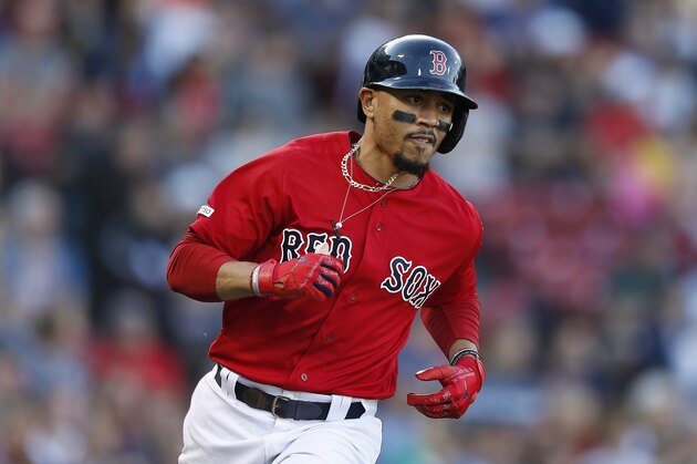 Boston Red Sox's Mookie Betts plays against the Baltimore Orioles during the fifth inning of a baseball game in Boston, Sunday, Sept. 29, 2019. (AP Photo/Michael Dwyer)