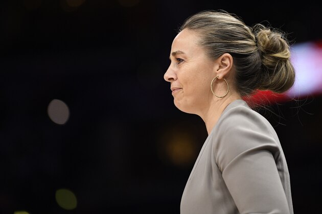 San Antonio Spurs head assistant coach Becky Hammon watches during the second half of an NBA basketball game against the Washington Wizards, Wednesday, Nov. 20, 2019, in Washington. The Wizards won 138-132. (AP Photo/Nick Wass)