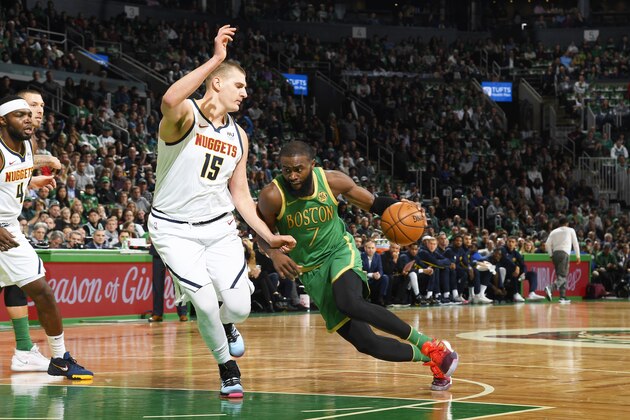 BOSTON, MA - DECEMBER 6: Jaylen Brown #7 of the Boston Celtics handles the ball against the Denver Nuggets on December 6, 2019 at the TD Garden in Boston, Massachusetts.  NOTE TO USER: User expressly acknowledges and agrees that, by downloading and or using this photograph, User is consenting to the terms and conditions of the Getty Images License Agreement. Mandatory Copyright Notice: Copyright 2019 NBAE  (Photo by Brian Babineau/NBAE via Getty Images)