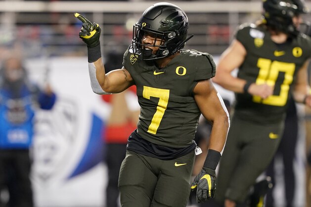 SANTA CLARA, CALIFORNIA - DECEMBER 06: Running back CJ Verdell #7 of the Oregon Ducks celebrates after he scored on a three yard touchdown run against the Utah Utes during the first half of the Pac-12 Championship Game at Levi's Stadium on December 06, 2019 in Santa Clara, California. (Photo by Thearon W. Henderson/Getty Images)