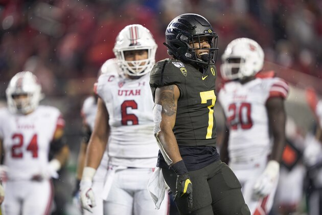 Oregon running back CJ Verdell (7) celebrates after scoring a touchdown against Utah during the second half of an NCAA college basketball game for the Pac-12 Conference championship in Santa Clara, Calif., Friday, Dec. 6, 2018. Oregon won 37-15. (AP Photo/Tony Avelar)