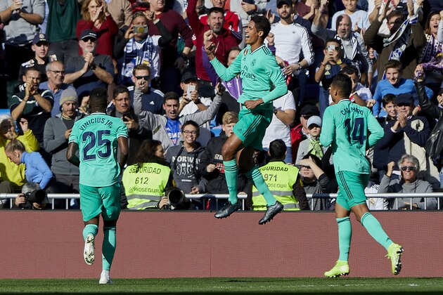 MADRID, SPAIN - DECEMBER 07: Raphael Varane of Real Madrid celebrates goal during the Liga match between Real Madrid CF and RCD Espanyol at Estadio Santiago Bernabeu on December 7, 2019 in Madrid, Spain. (Photo by Perez Meca/MB Media/Getty Images)
