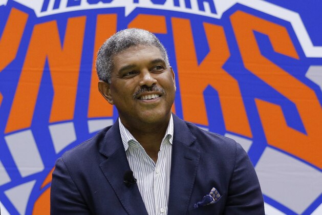 FILE - In this July 8, 2016, file photo, New York Knicks general manager Steve Mills answer questions during an NBA basketball news conference at the team's training facility in Greenburgh, N.Y. A person with knowledge of the details says the Knicks have promoted Steve Mills to president and hired Scott Perry as general manager. Mills takes over the position left vacant by Phil Jackson's departure last month, the person told The Associated Press on Thursday, July 13, 2017. (AP Photo/Julie Jacobson, File) FILE - In this July 8, 2016, file photo, New York Knicks general manager Steve Mills answer questions during an NBA basketball news conference at the team's training facility in Greenburgh, N.Y. A person with knowledge of the details says the Knicks have promoted Steve Mills to president and hired Scott Perry as general manager. Mills takes over the position left vacant by Phil Jackson's departure last month, the person told The Associated Press on Thursday, July 13, 2017. (AP Photo/Julie Jacobson, File)