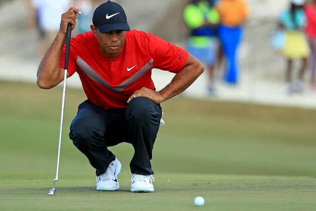 NASSAU, BAHAMAS - DECEMBER 07: Tiger Woods of the United States lines up a putt on the first hole during the final round of the Hero World Challenge at Albany on December 07, 2019 in Nassau, Bahamas. (Photo by Mike Ehrmann/Getty Images)