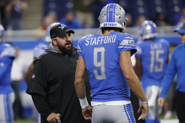 Detroit Lions head coach Matt Patricia talks with quarterback Matthew Stafford before an NFL football game against the Los Angeles Chargers in Detroit, Sunday, Sept. 15, 2019. (AP Photo/Rick Osentoski)