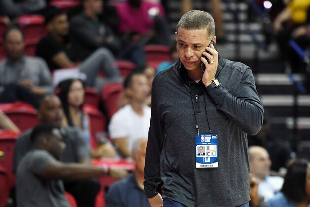 LAS VEGAS, NEVADA - JULY 07:  General manager Scott Perry of the New York Knicks talks on a phone as he attends a game between the Knicks and the Phoenix Suns during the 2019 NBA Summer League at the Thomas & Mack Center on July 7, 2019 in Las Vegas, Nevada. NOTE TO USER: User expressly acknowledges and agrees that, by downloading and or using this photograph, User is consenting to the terms and conditions of the Getty Images License Agreement.  (Photo by Ethan Miller/Getty Images)