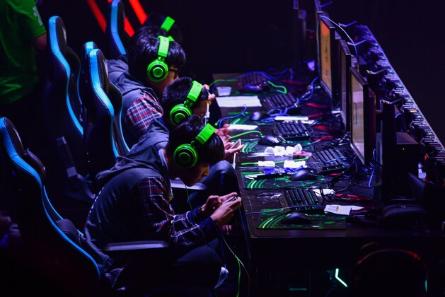 Thailand players focus during their game against Myanmar for the eSports (electronic sports) Mobile Legends Bang Bang matches at the 30th SEA Games ( Southeast Asian Games) in Manila on December 7, 2019. - eSports edged further into the mainstream sports world with this week's debut at the Southeast Asian Games, but the holy grail -- Olympic recognition -- remains stubbornly out of reach. (Photo by Maria TAN / AFP) (Photo by MARIA TAN/AFP via Getty Images)
