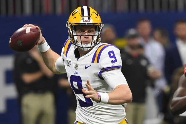 LSU quarterback Joe Burrow (9) works in the pocket against Georgia during the first half of the Southeastern Conference championship NCAA college football game, Saturday, Dec. 7, 2019, in Atlanta. (AP Photo/John Amis)