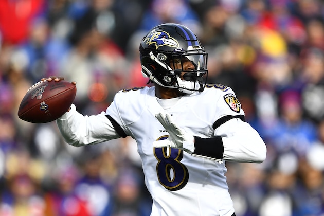 Baltimore Ravens quarterback Lamar Jackson looks to pass during the first half of an NFL football game against the Buffalo Bills in Orchard Park, N.Y., Sunday, Dec. 8, 2019. (AP Photo/Adrian Kraus)