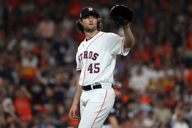 HOUSTON, TEXAS - OCTOBER 22:  Gerrit Cole #45 of the Houston Astros reacts after allowing a run against the Washington Nationals during the fifth inning in Game One of the 2019 World Series at Minute Maid Park on October 22, 2019 in Houston, Texas. (Photo by Elsa/Getty Images)